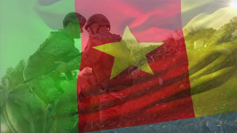 Animation-of-flag-of-cameroon-over-caucasian-male-soldiers-helping-each-other