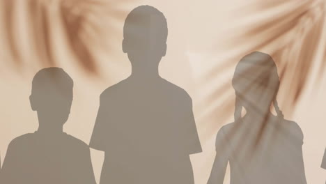 Animation-of-silhouettes-of-children-and-palm-tree-shadow-on-beige-background