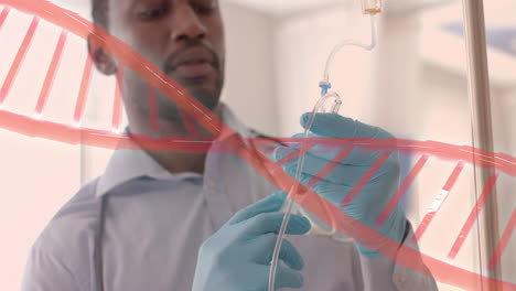 Animation-of-dna-strand-over-african-american-male-doctor-with-drip-in-hospital