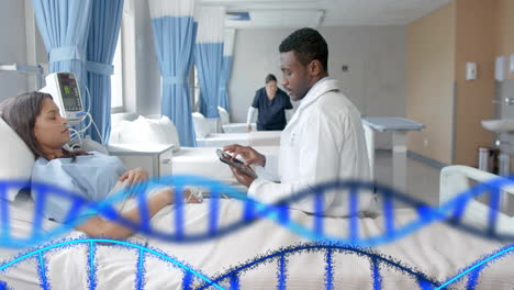 Animation-of-dna-strands-over-diverse-male-doctor-and-patient-in-hospital