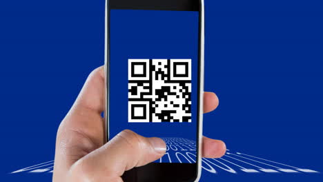 Animation-of-qr-code-on-screen-of-smartphone-held-by-caucasian-man