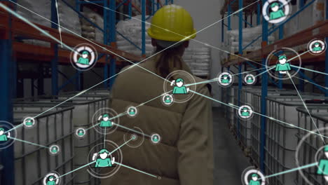 Animation-of-network-of-connections-with-icons-over-caucasian-female-worker-in-warehouse