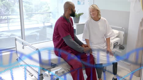 Animation-of-dna-strands-over-diverse-male-doctor-and-senior-female-patient-talking-at-hospital