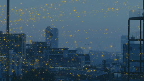 Animation-of-glowing-spots-floating-over-cityscape