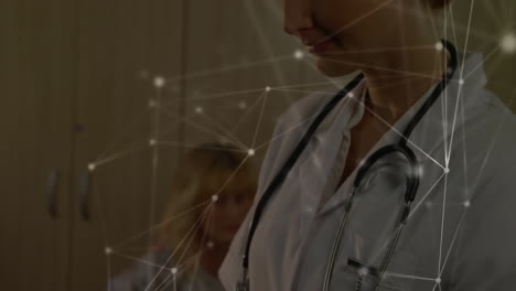 Animation-of-connections-over-caucasian-female-doctor-in-hospital