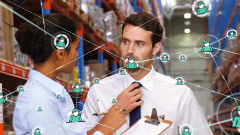 Animation-of-network-of-connections-with-icons-over-diverse-people-working-in-warehouse