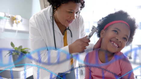 Animation-of-dna-strands-over-african-american-female-doctor-checking-ear-of-happy-girl-patient