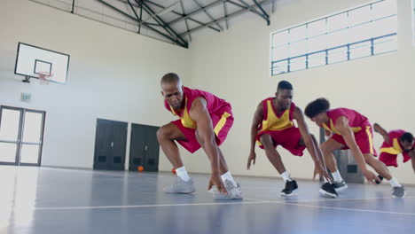 Basketball-players-practice-in-an-indoor-court