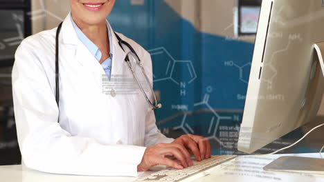 Animation-of-chemical-formula-and-data-processing-over-caucasian-female-doctor-using-computer