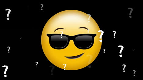 Animation-of-smiling-emoji-icon-with-sunglasses-with-question-marks-on-black-background