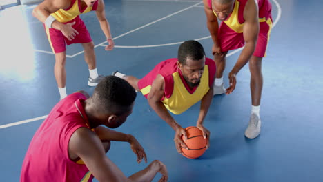Basketball-players-strategize-on-the-court