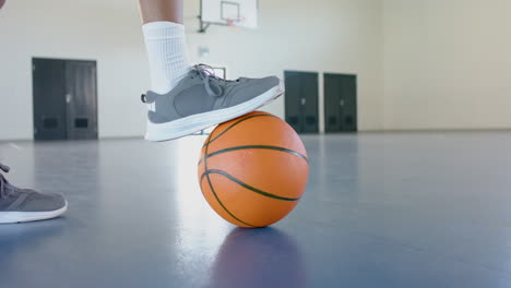 Person-plays-basketball-indoors