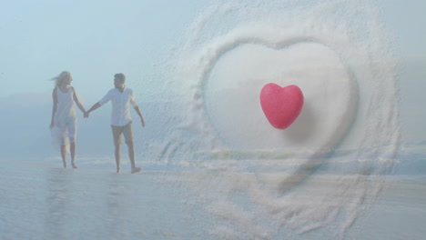 Animation-of-hearts-over-happy-diverse-couple-holding-hands-on-beach-by-sea