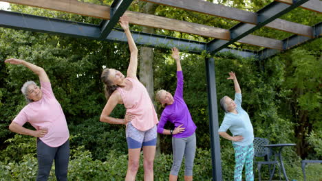 Senior-diverse-group-of-women-exercising-outdoors
