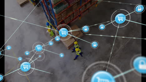 Animation-of-network-of-connections-with-shopping-trolley-icons-over-diverse-people-in-warehous