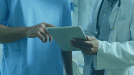 Animation-of-data-processing-with-world-map-over-diverse-doctors-using-tablet