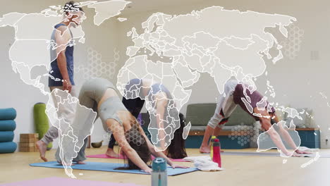 Animation-of-world-map-and-processing-data-over-diverse-male-instructor-and-female-yoga-class