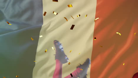 Animation-of-confetti-and-flag-of-france-over-african-american-man-playing-rugby