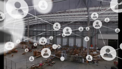 Animation-of-network-of-connections-with-people-icons-over-warehouse