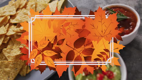 Animation-Eines-Rahmens-Mit-Herbstblättern-über-Nachos-Mit-Dips