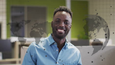 Animation-Des-Globus-Und-Der-Digitalen-Datenverarbeitung-über-Einem-Afroamerikanischen-Geschäftsmann-Im-Büro