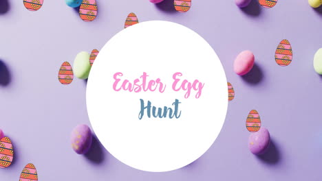 Animation-of-easter-egg-hunt-text-over-colourful-easter-eggs-on-purple-background