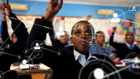 Animation-of-network-of-connections-with-icons-over-african-american-schoolchildren-raising-hands