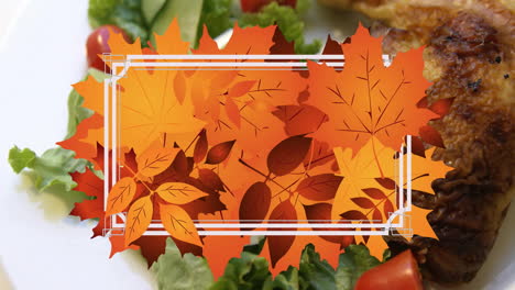 Animation-of-frame-with-fall-leaves-over-meat-with-salad