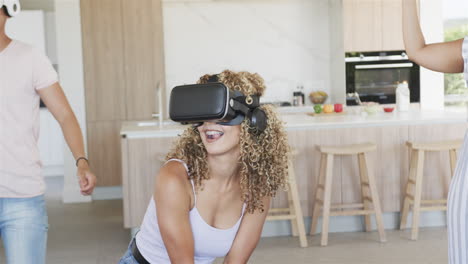 Young-biracial-women-enjoy-virtual-reality-at-home
