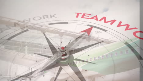 Animation-Eines-Kompasses-Mit-Pfeil,-Der-Auf-Den-Text-„Teamwork“-über-Einem-Passagierflugzeug-Auf-Der-Landebahn-Zeigt