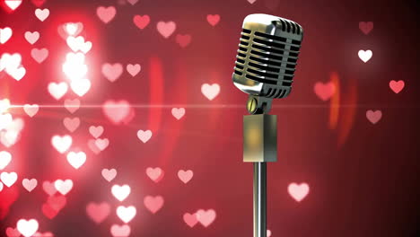 Animation-of-microphone-over-hearts-on-black-background