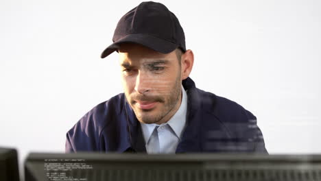 Animation-of-data-processing-over-caucasian-security-man-using-computer