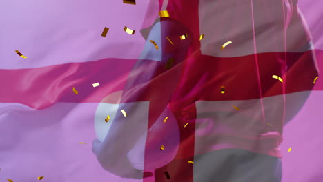 Animation-of-confetti-and-flag-of-england-over-african-american-male-rugby-player