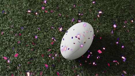 Animation-Von-Konfetti-über-Einem-Weißen-Rugbyball-Auf-Gras