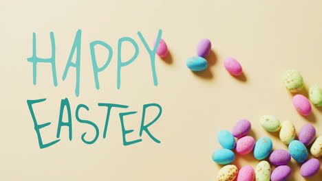 Animation-of-happy-easter-text-over-colourful-easter-eggs-on-yellow-background