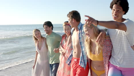 Diverse-group-of-friends-enjoy-a-day-at-the-beach