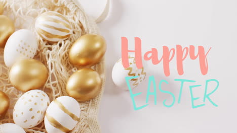Animation-of-happy-easter-text-over-white-and-gold-easter-eggs-on-white-background