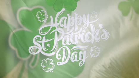 Animation-of-shamrocks-and-happy-st-patrick's-day-text-over-flag-of-ireland
