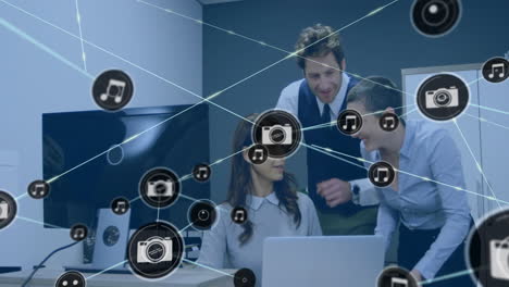 Animation-of-network-of-connections-with-camera-icons-over-diverse-business-people-in-office