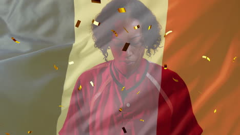 Animation-Von-Konfetti-Und-Der-Französischen-Flagge-über-Einer-Gemischtrassigen-Rugbyspielerin