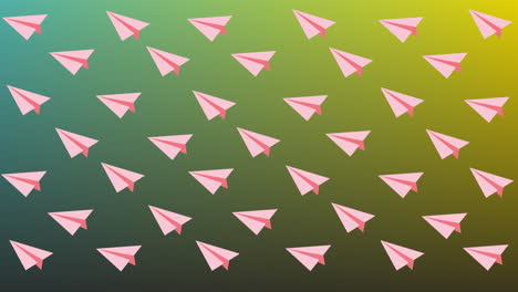 Animation-of-repeated-pink-paper-planes-moving-over-soft-green-to-yellow-background