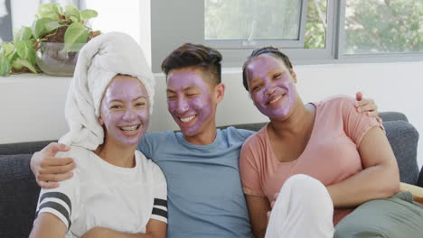 Young-Asian-man-and-two-young-Biracial-women-enjoy-a-spa-day-at-home