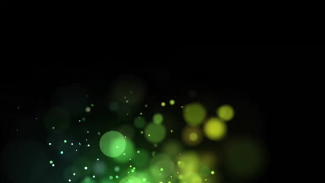 Animation-of-green-spots-moving-on-black-background