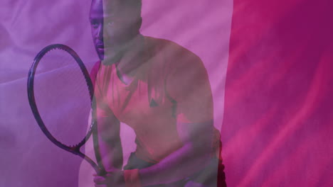 Animation-of-flag-of-france-over-african-american-male-tennis-player