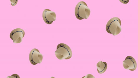 Animation-of-straw-hats-on-pink-background