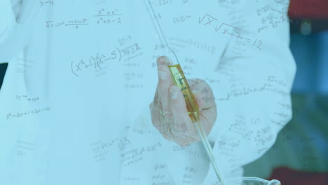Animation-of-mathematical-equations-over-caucasian-male-scientist-working-in-lab
