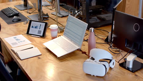 A-modern-business-office-desk-is-equipped-with-various-tech-gadgets