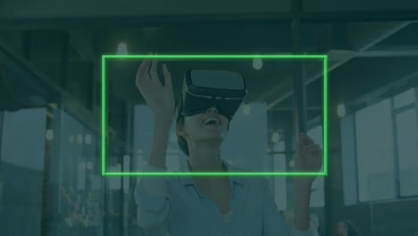 Animation-of-neon-frame-over-caucasian-woman-using-vr-headset-in-office