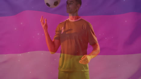 Animation-Der-Flagge-Deutschlands-über-Einem-Kaukasischen-Männlichen-Fußballspieler-Mit-Ball