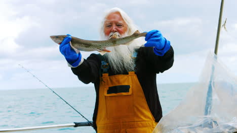 Fisherman-holding-fish